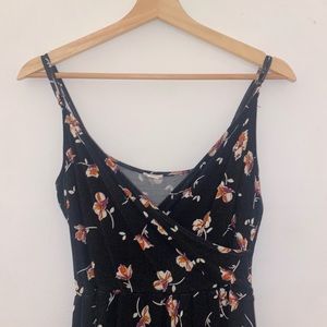 Garage Romper Cross-front with Black and Floral Tropical Pattern